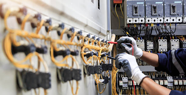 Professional Electrician technician working in Paris, AR